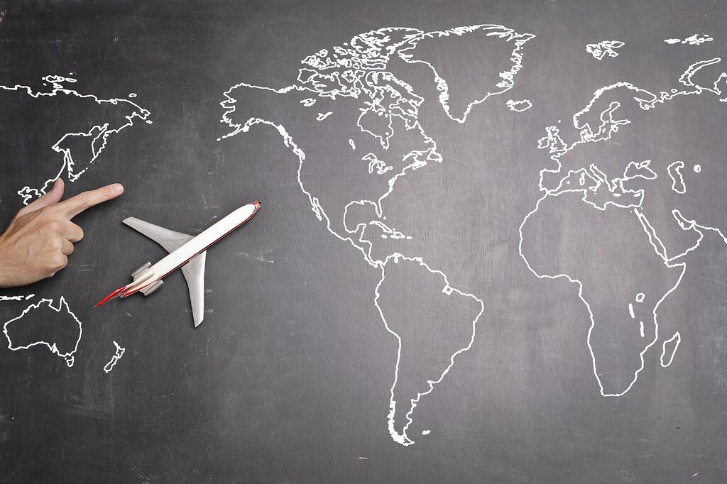 Inspirational Username for Instagram airplane over world map on blackboard